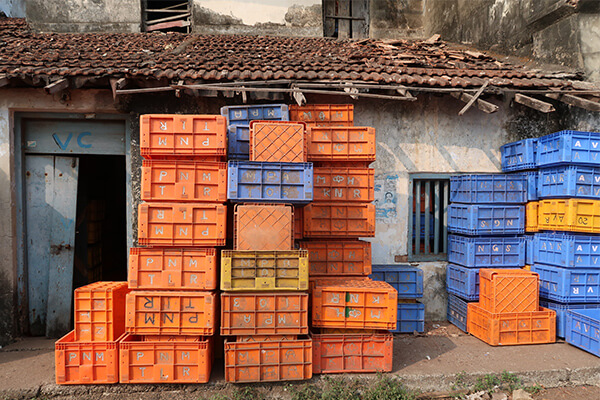 Orange and blue crates stacked