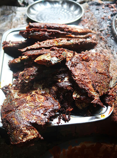 fried fish on a silver plate