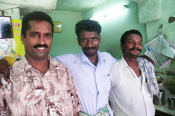 3 Indian men standing together