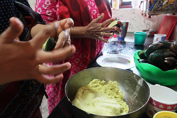 close shot of hands preparing food